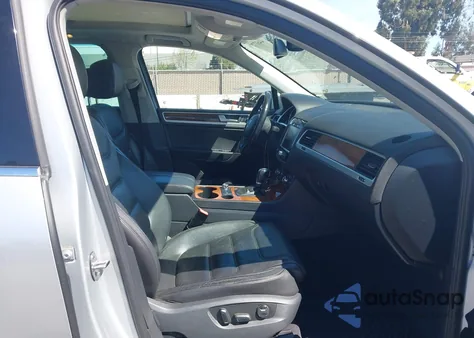 2012 Volkswagen Touareg Hybrid from USA, damaged, VIN WVGEG9BP4CD010507